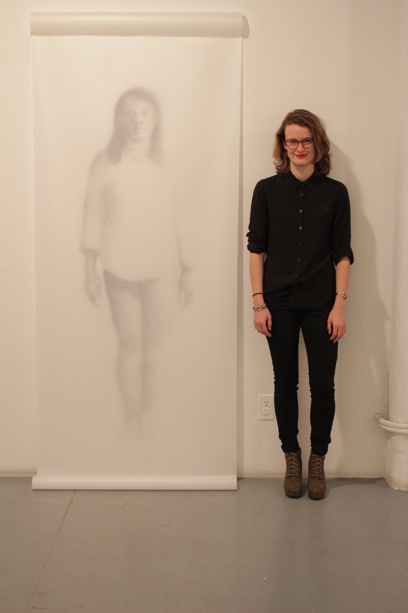 Allie with one of her pieces at Rush Arts Gallery NYC © Erin Sanger, 2016